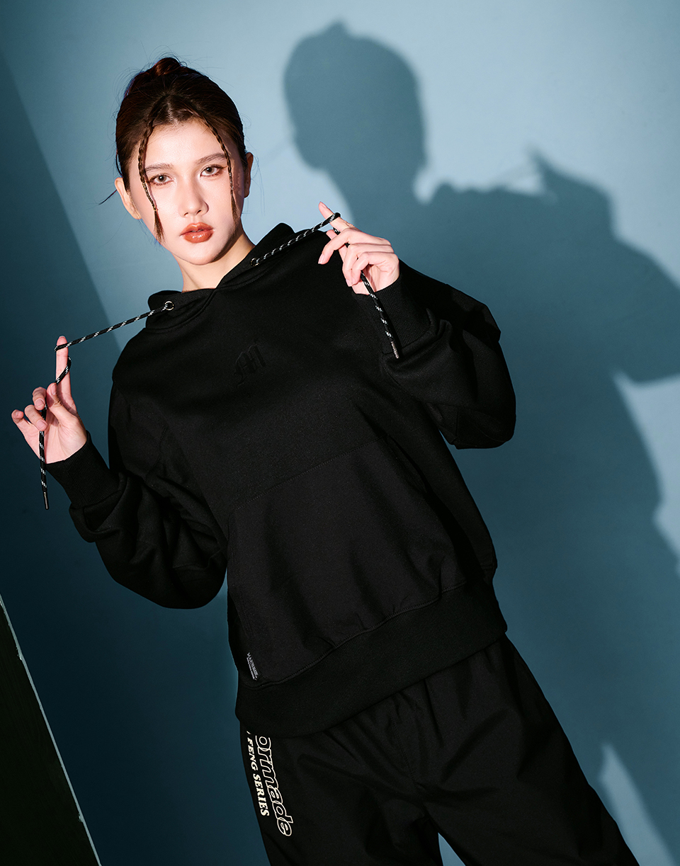 M字雙材質拼接口袋帽T